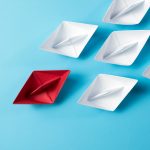 Leadership concept using origami ship